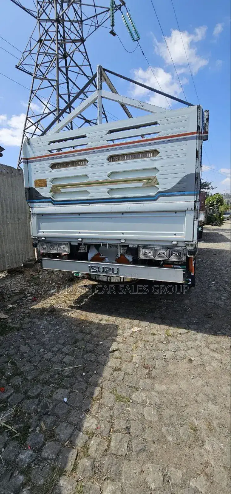 Isuzu. 2023 White