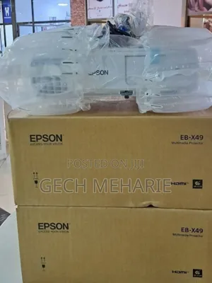 Brand New EPSON Projector
With Manual CD and Cart