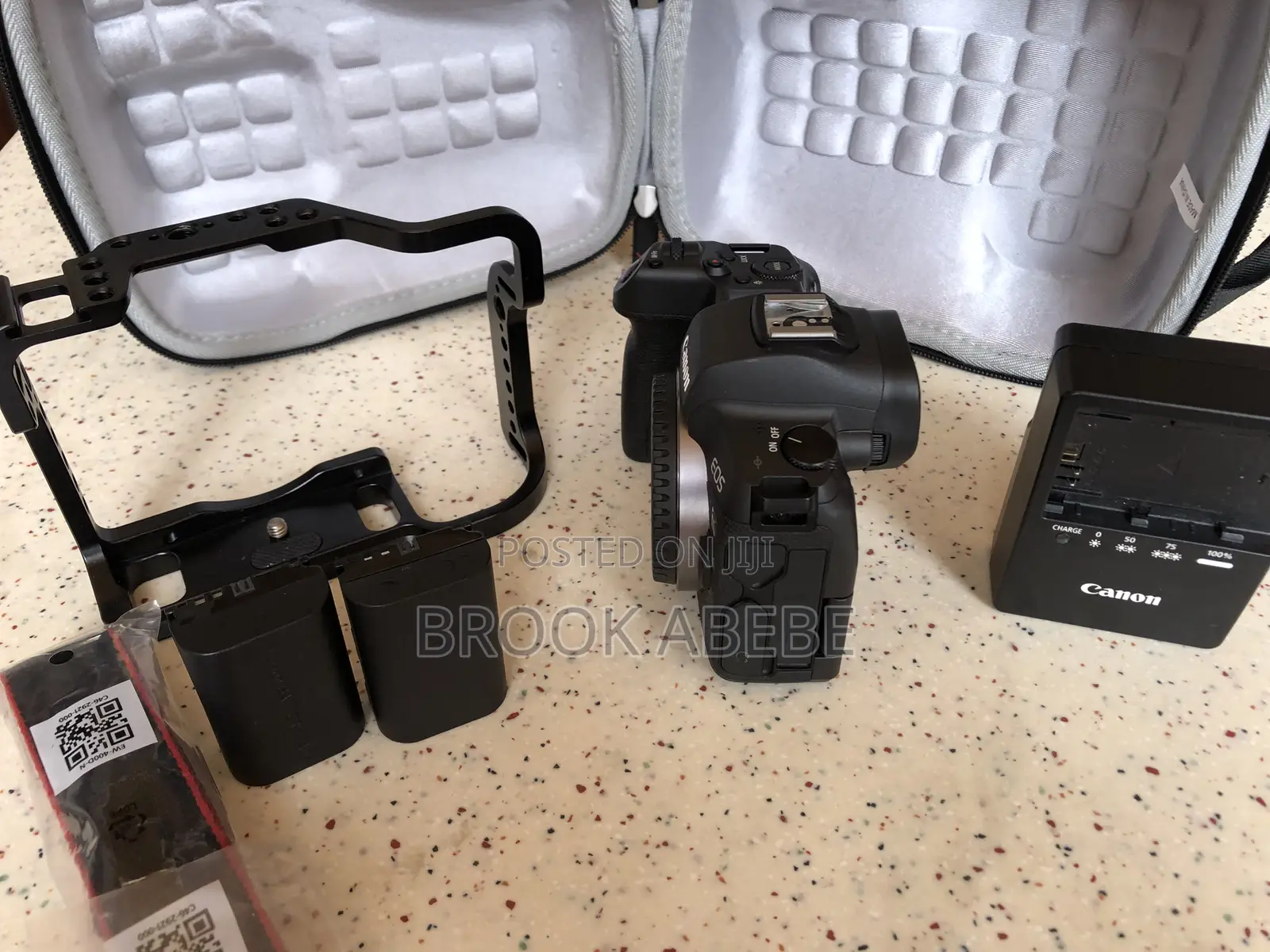 Canon R With Cage and Extras on Hand