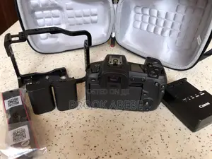 Canon R With Cage and Extras on Hand