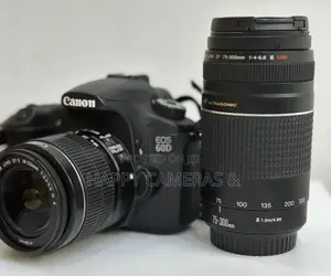 60d Canon + Canon18-55mm + Canon 75-300mm