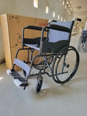 Wheelchair$፭equipped With a Safety Belt to Secure the User