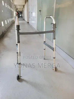 Walker for Senior Adult. Front Wheels. Made Out of Aluminium