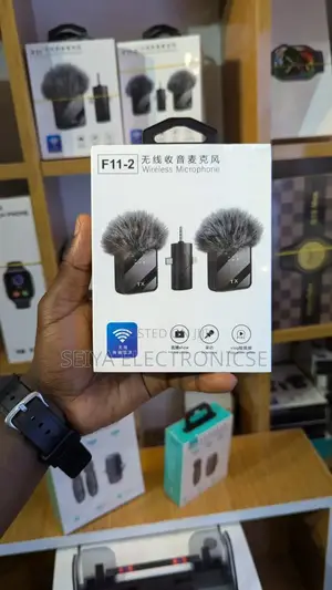 F11 -2 Wireless Microphone ●3-in-1 Receiver: