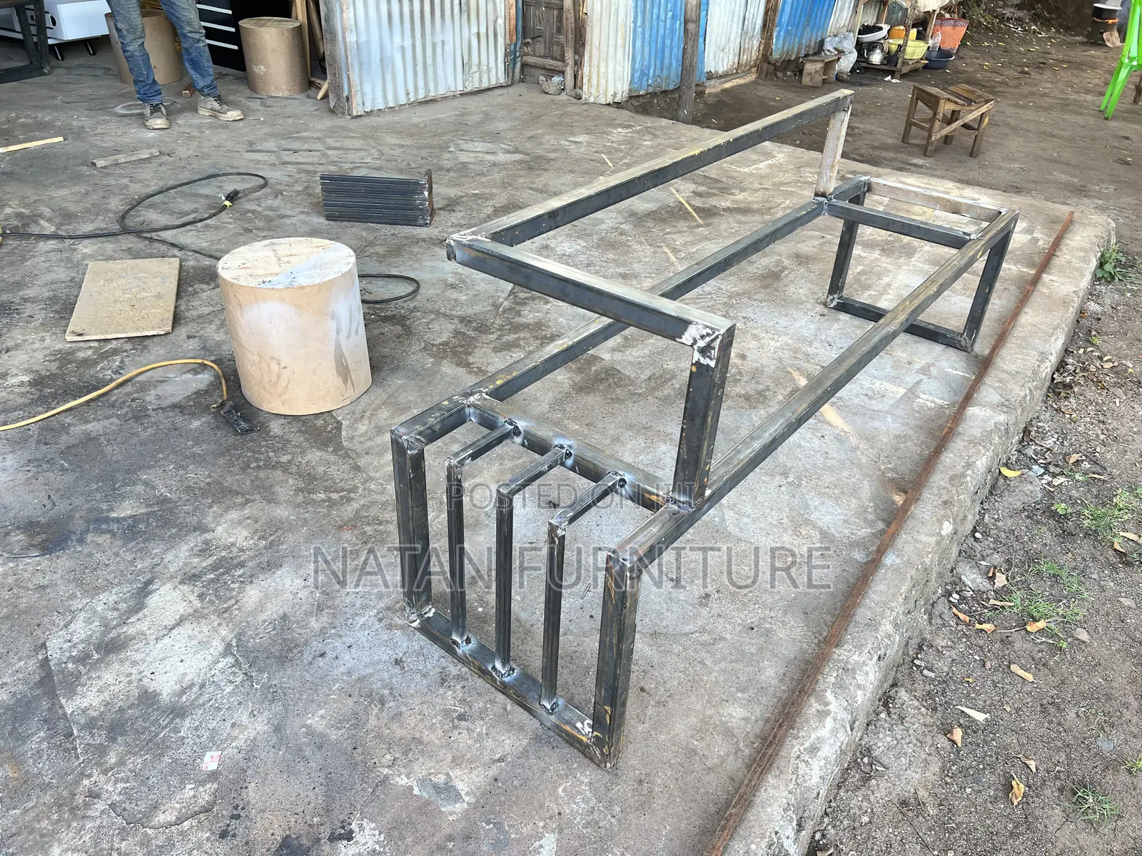 Modern Outdoor Bench With a Metal Frame and Wooden Slats