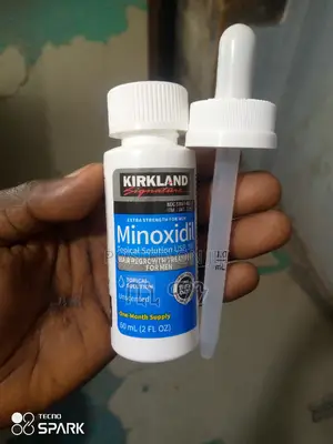 Droplet Liquid Kirkland Organic Hair Oil.