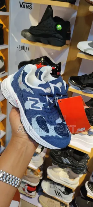 Now Available in Our Sho Quality"New Balance Blue 2002r