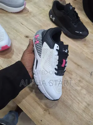 Under Armour Ladies Sport Sneakers 
 Made in Vietnam