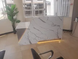 Reception Table Designed to Create a Welcoming First Impression.