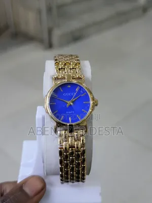 Vintage Gucci Gold-Plated Quartz Watch With a Blue Dial.