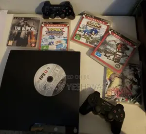 Playstation 3 (Ps3) + 2 Controllers + Game CDS – Great Condition