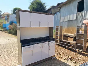 ወጥን የሚያጣፍጥ Kitchen Cabinet