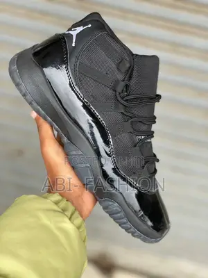 Air Jordan 11 Retro "Cap and Gown" Sneakers.
