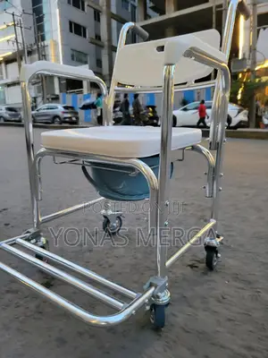 Commode Chair髷商toilet Chair窗二positioned Over a Standard Toilet.