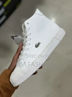A White Lacoste Gripshot Mid Sneaker
