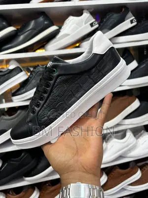 Men's Black and White Lacoste Low-Top Leather Sneaker