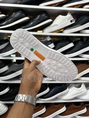 Men's Black and White Lacoste Low-Top Leather Sneaker