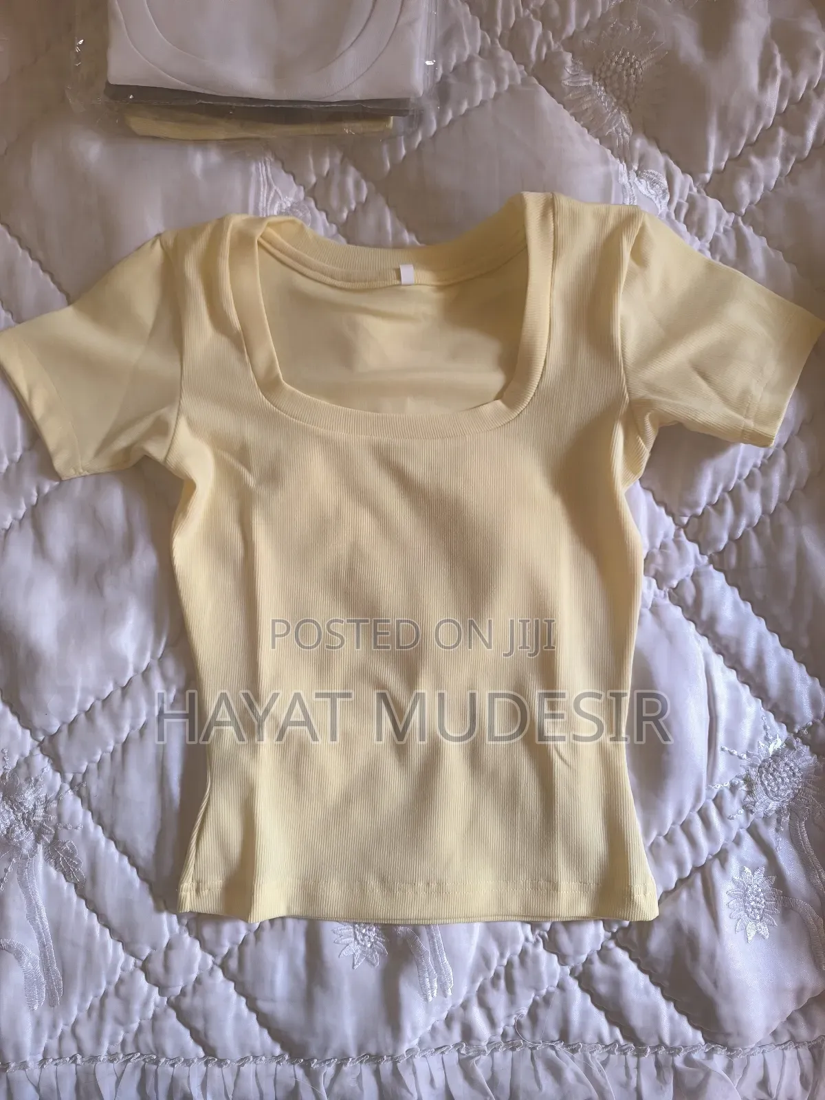 Cream U -Shape Top