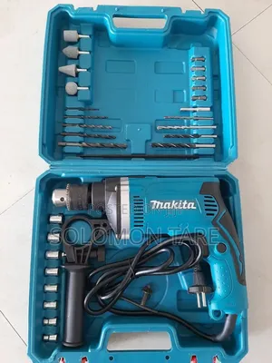 Makita Drill With Accessorie