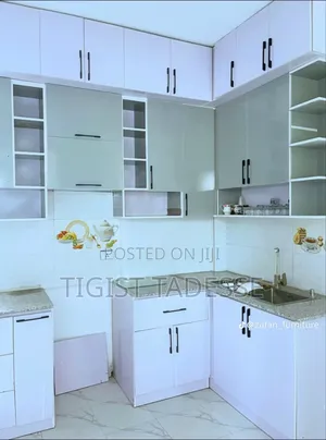 Kitchen Cabinet በውሀ እንዳይበላሽ ዘኮሎው እንጨት